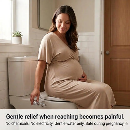 Pregnant woman using CleanRest bidet attachment in a home bathroom for comfortable reach-free hygiene during third trimester